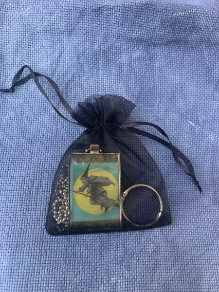 Vintage Witch flying on broom Necklace